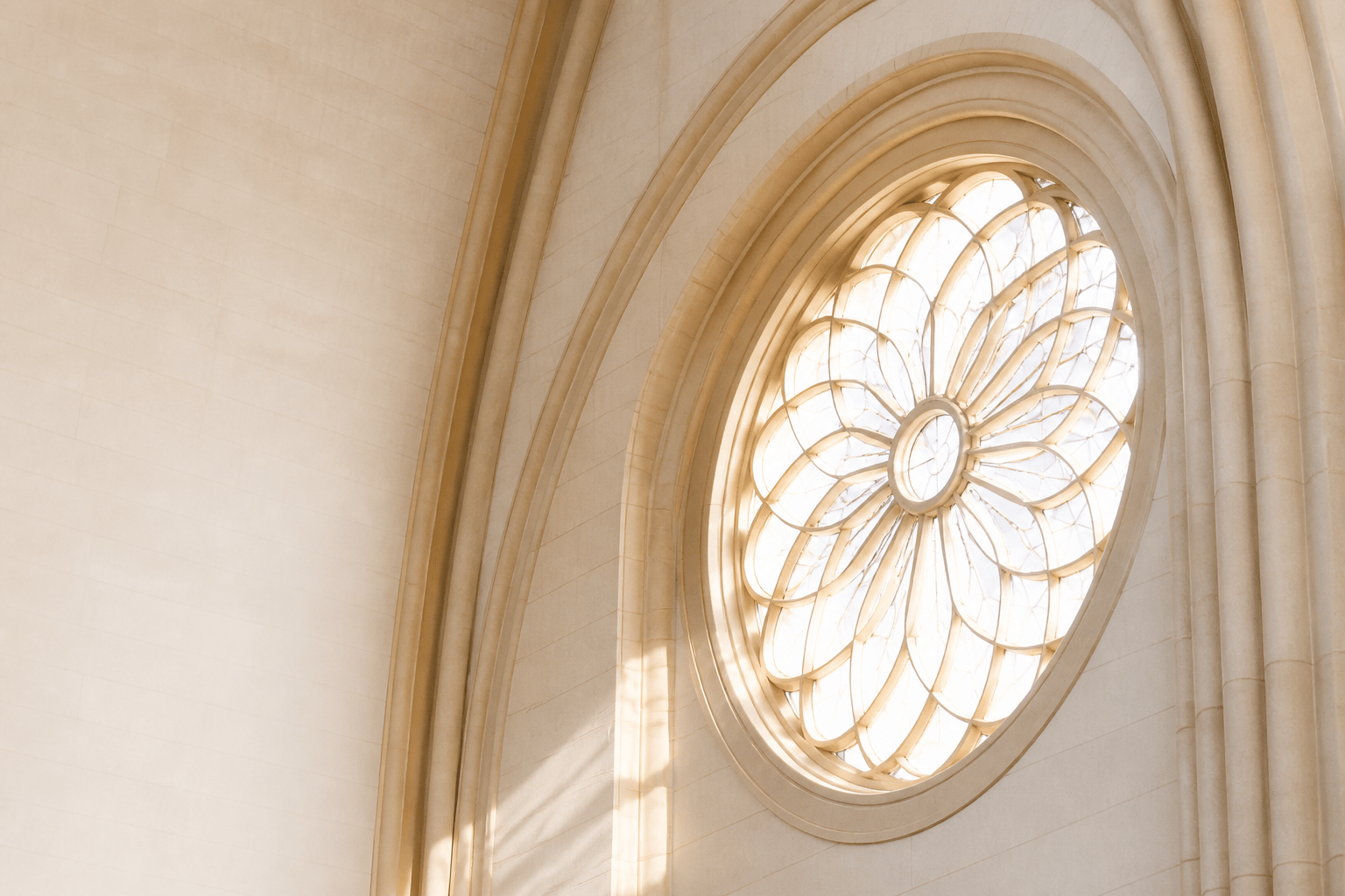 Sunlit stone church arches and a rose window